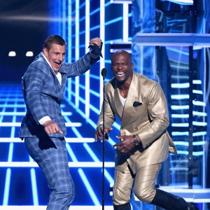 Rob Gronkowski and Terry Crews speak onstage during the 2019 Billboard Music Awards